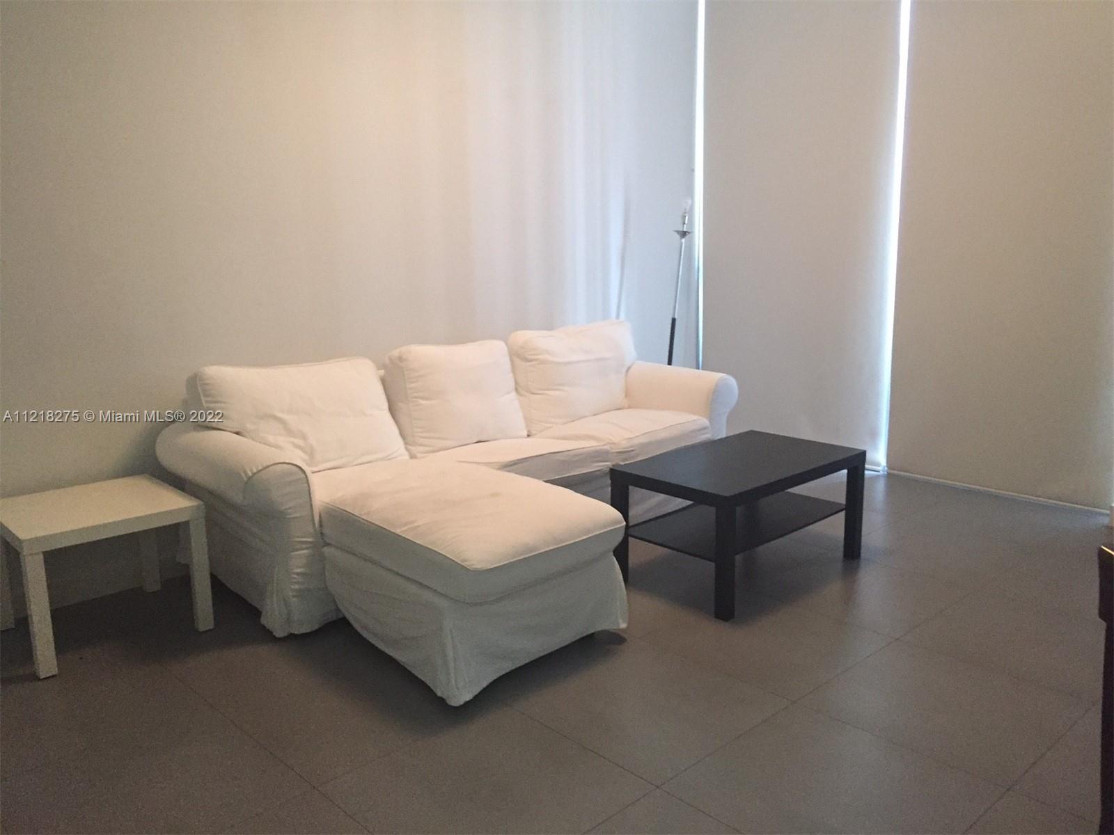 1050 BRICKELL AV # 2002