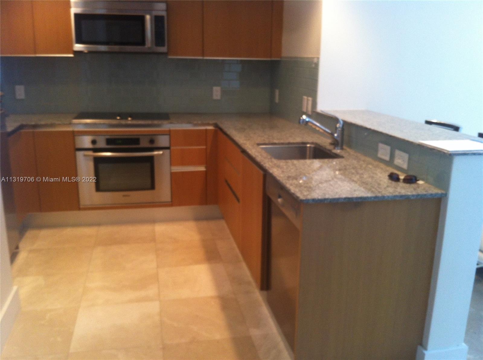 1050 BRICKELL AV # 1406