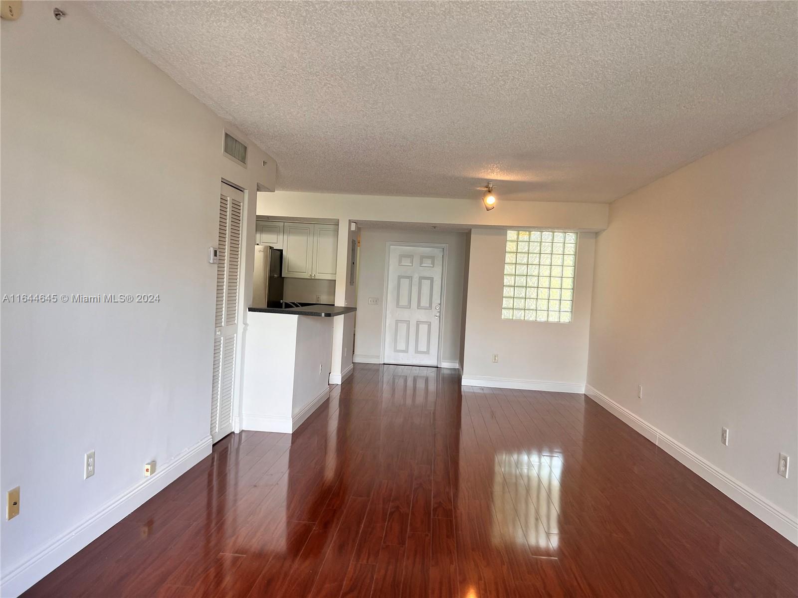 9645 NW 1st Ct # 208 Unit: 1-208