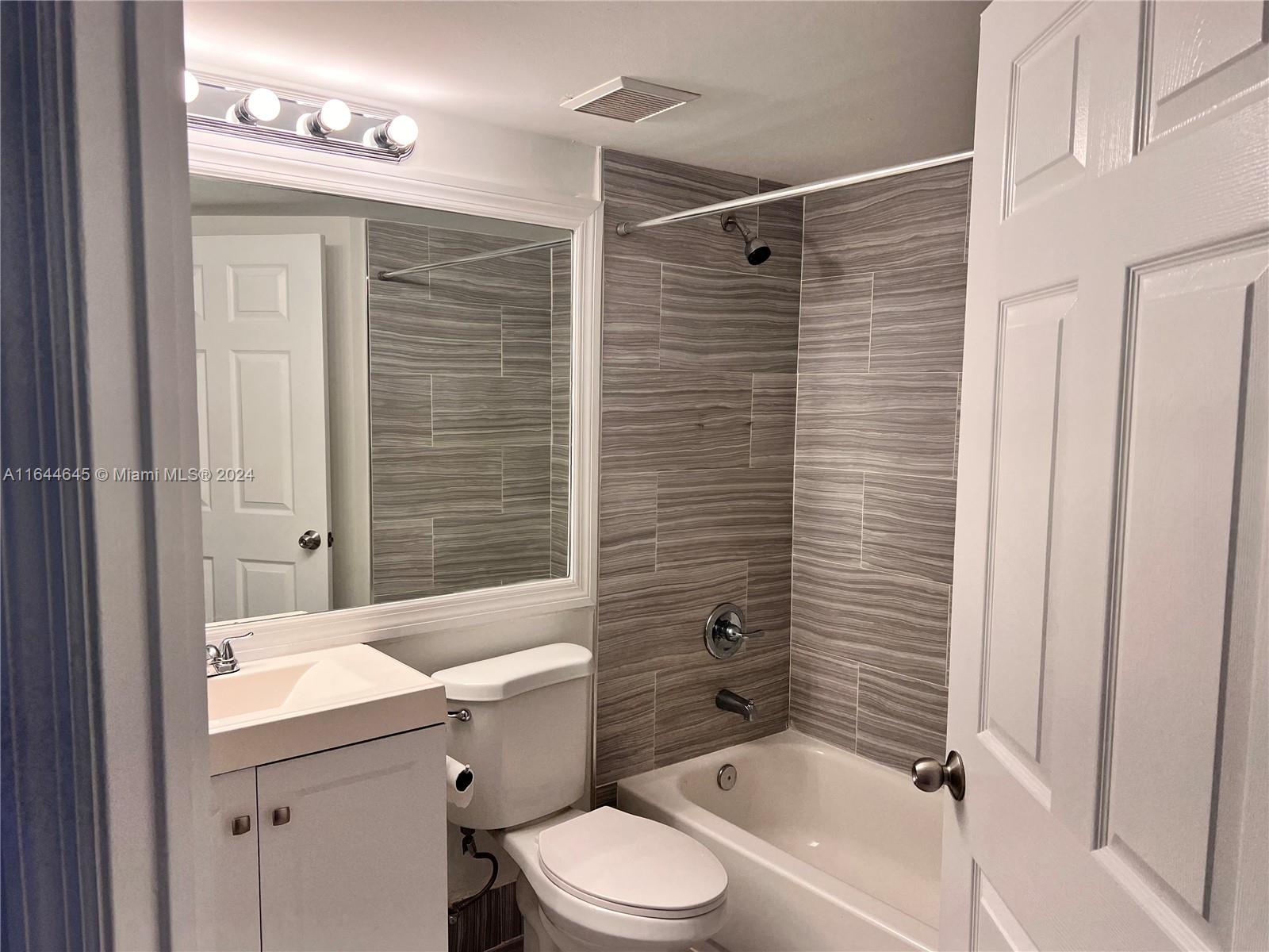 9645 NW 1st Ct # 208 Unit: 1-208