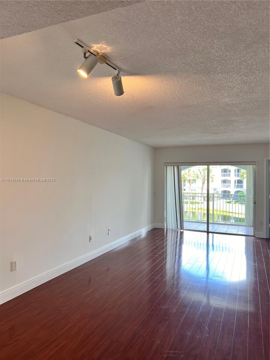 9645 NW 1st Ct # 208 Unit: 1-208