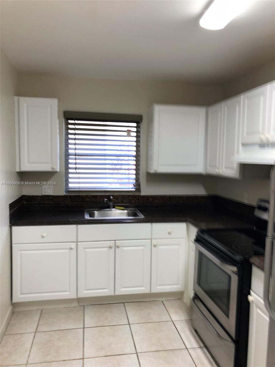 7787 SW 86th St # 104 Unit: E-104