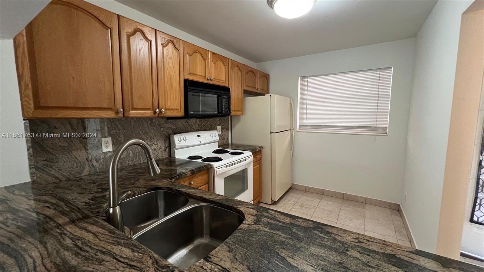 9501 Seagrape Dr # 203