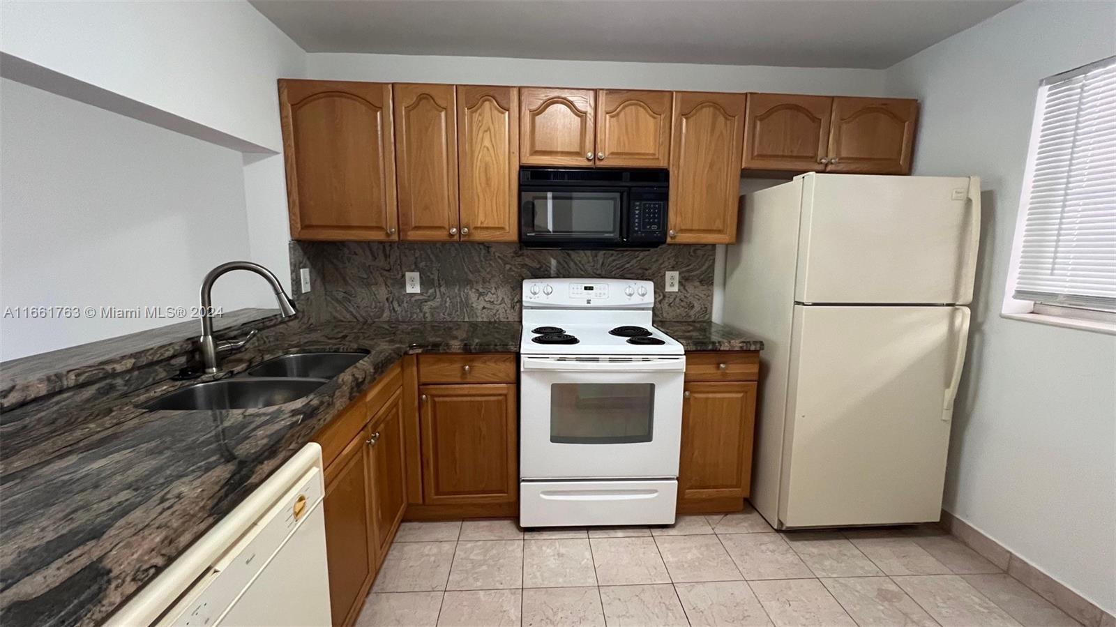 9501 Seagrape Dr # 203