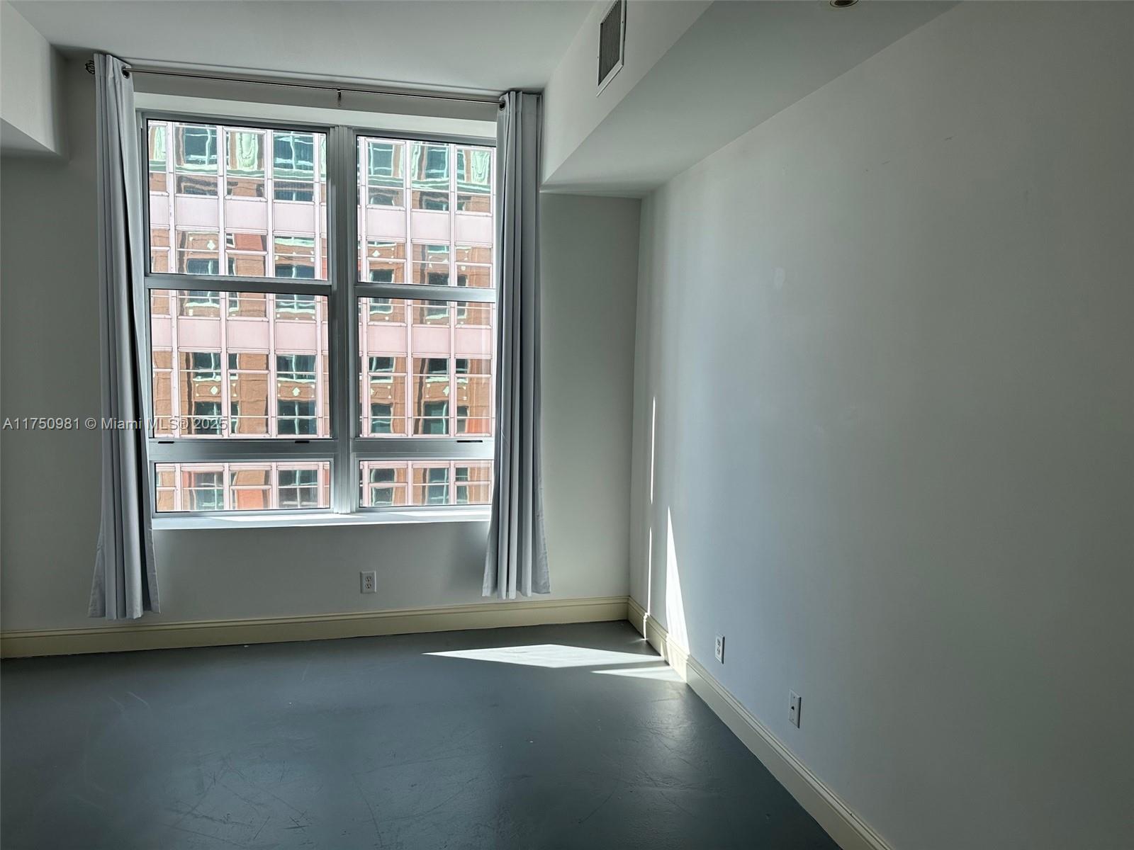 111 E Flagler # 702