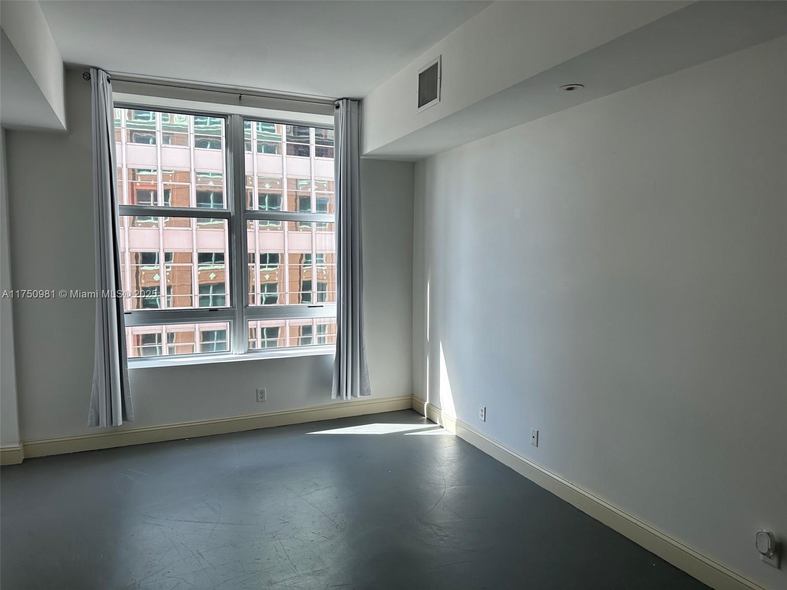 111 E Flagler # 702