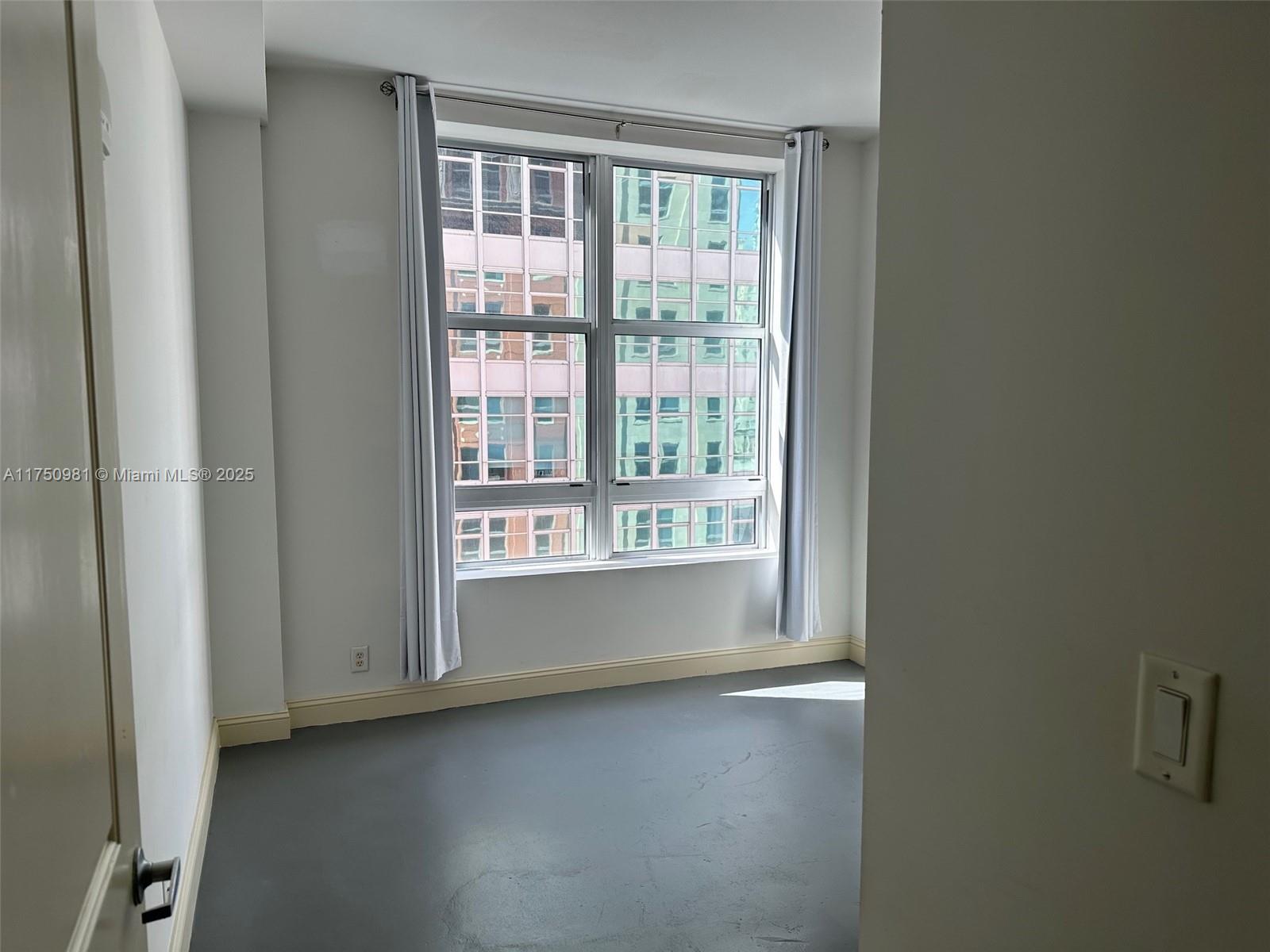 111 E Flagler # 702
