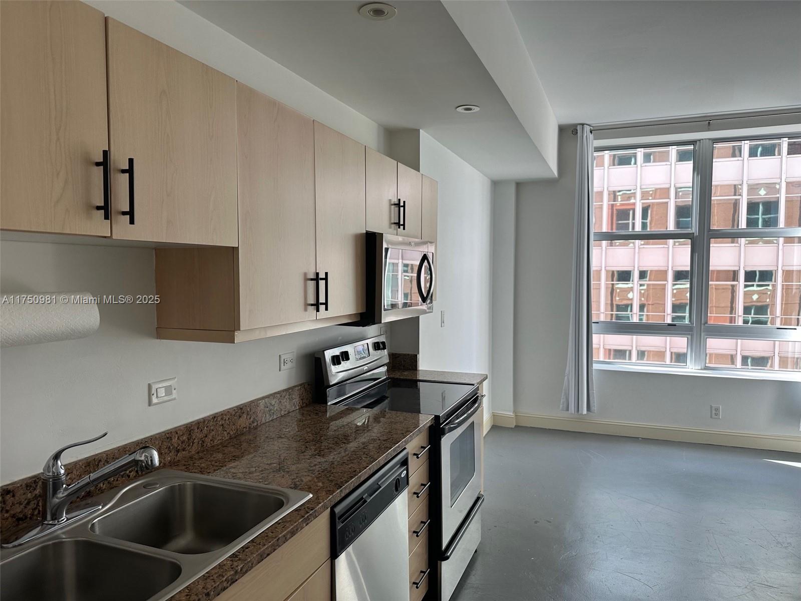 111 E Flagler # 702