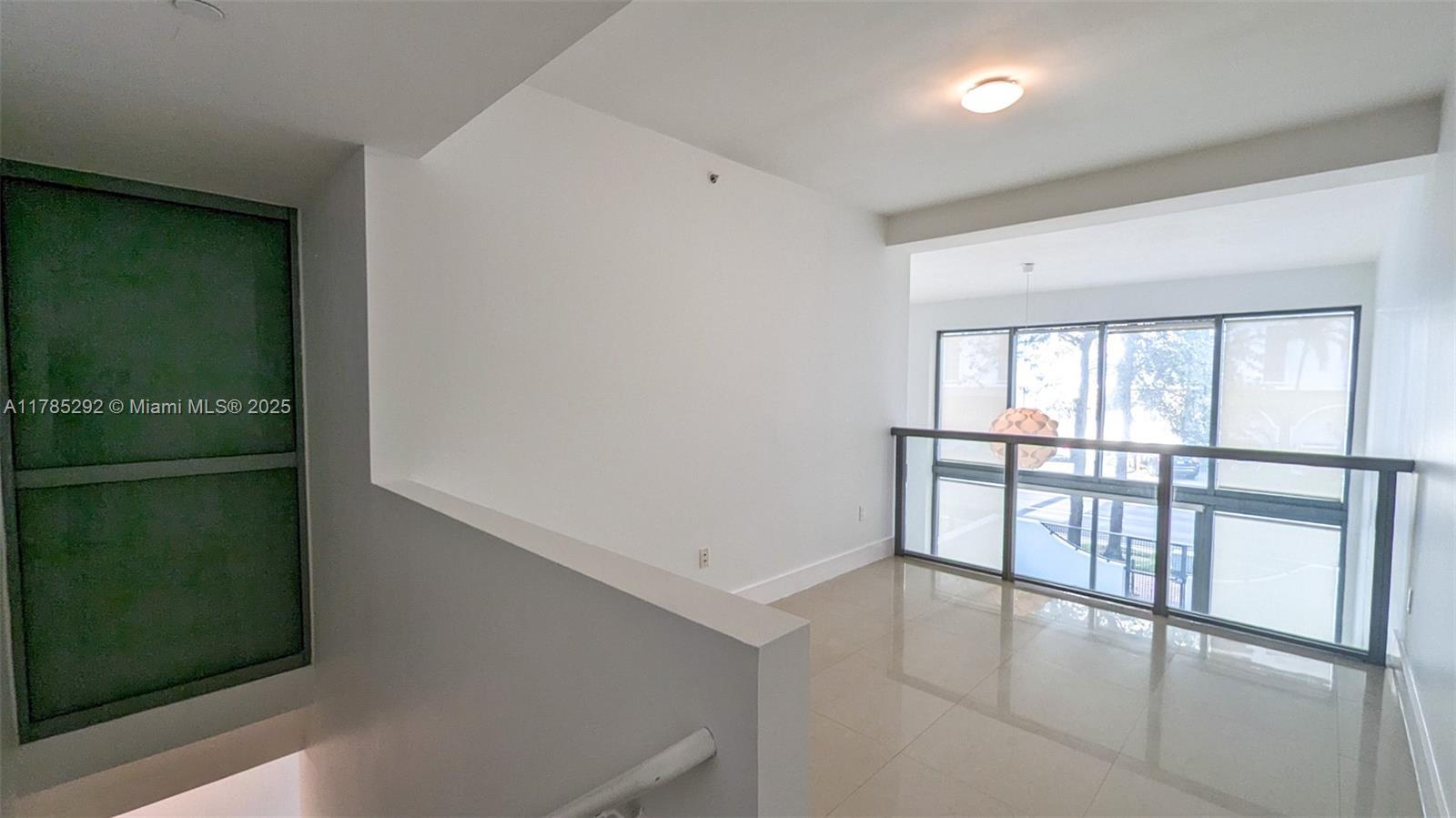 6000 Collins Ave # 103