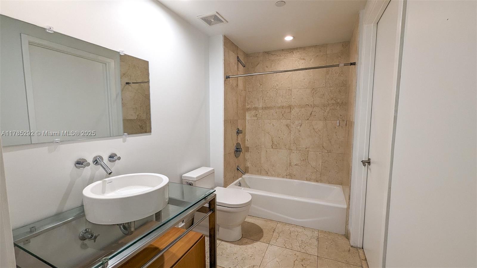6000 Collins Ave # 103