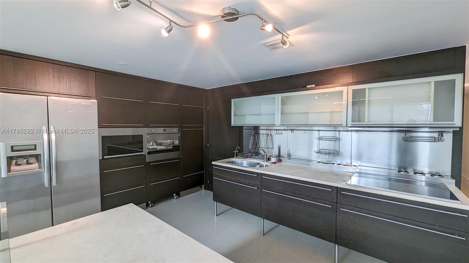 6000 Collins Ave # 103