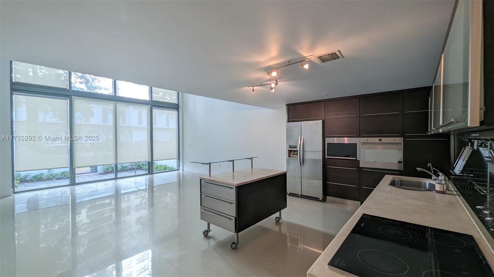 6000 Collins Ave # 103