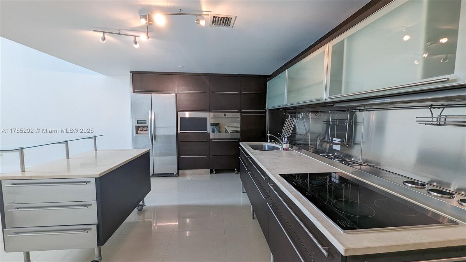 6000 Collins Ave # 103