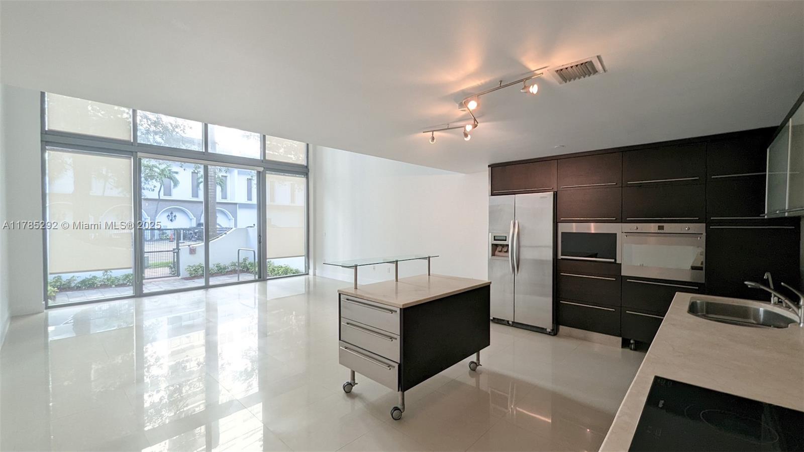 6000 Collins Ave # 103