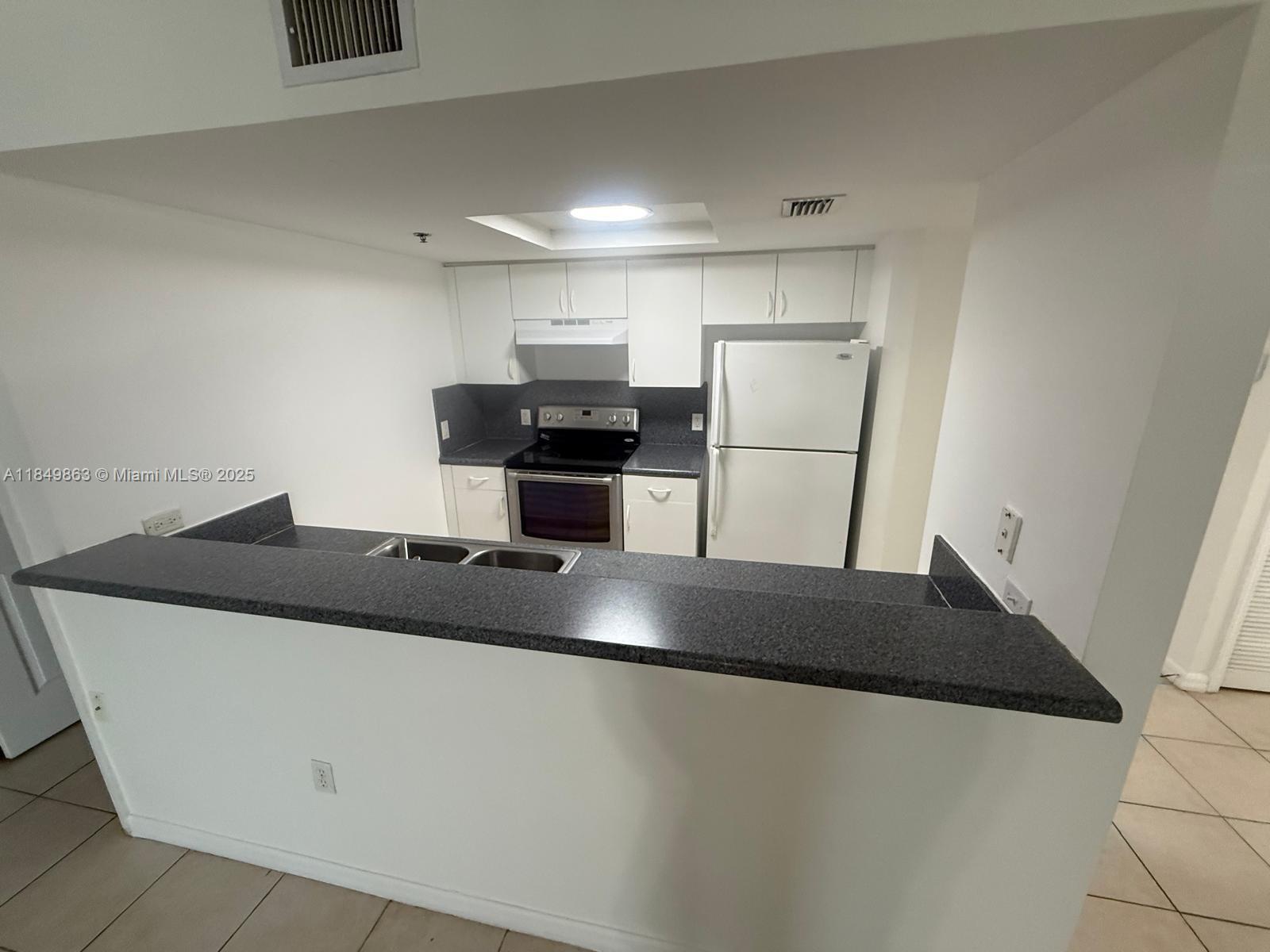2415 NW 16 ST RD # 1 Unit: 202-1