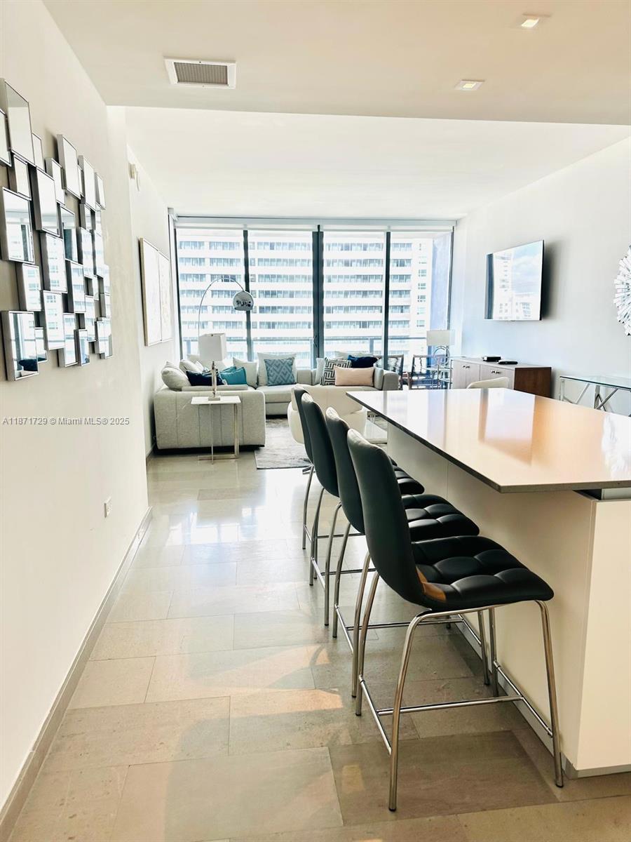 88 SW 7th St # 908