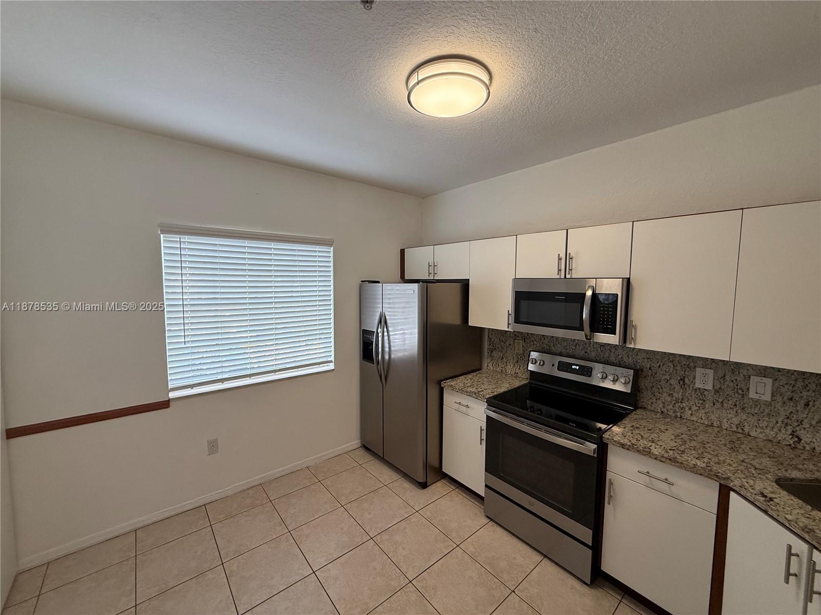 5620 NW 114 Path # 201