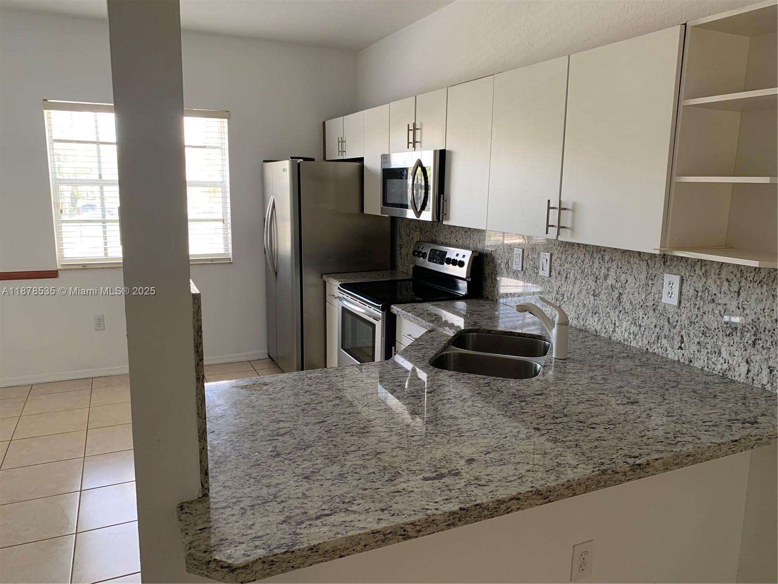 5620 NW 114 Path # 201