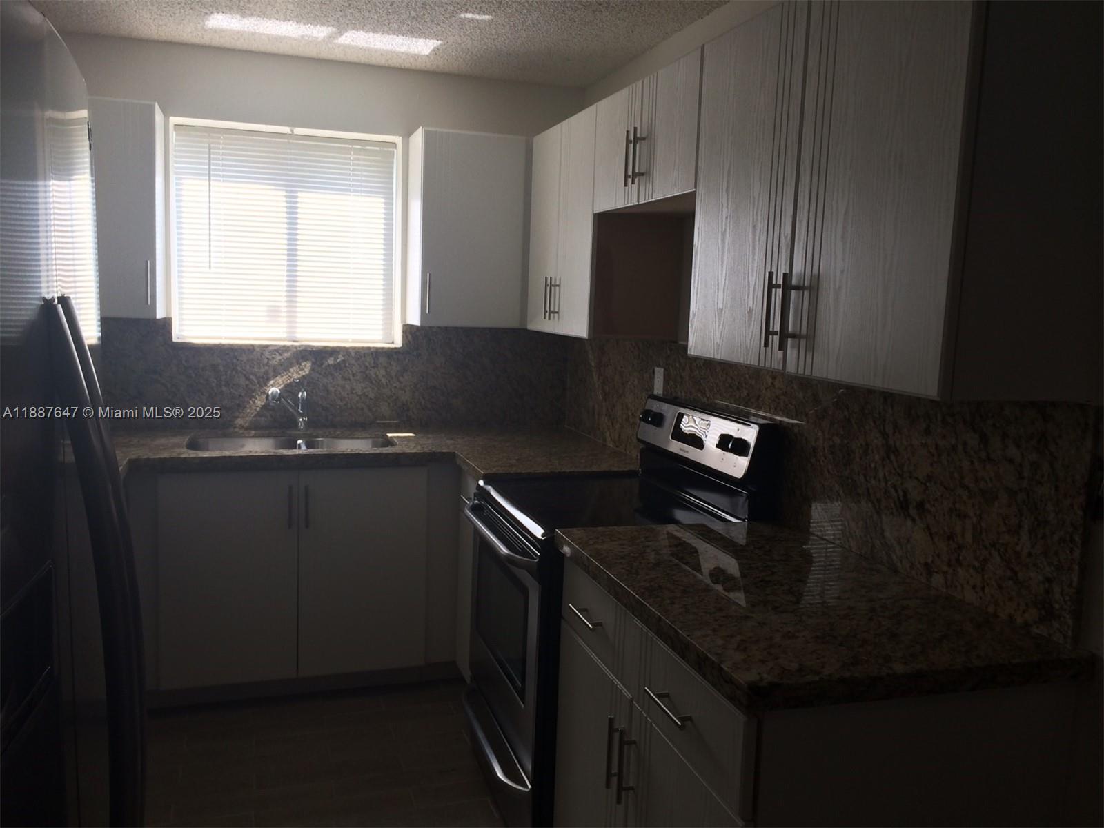11153 NW 37TH ST