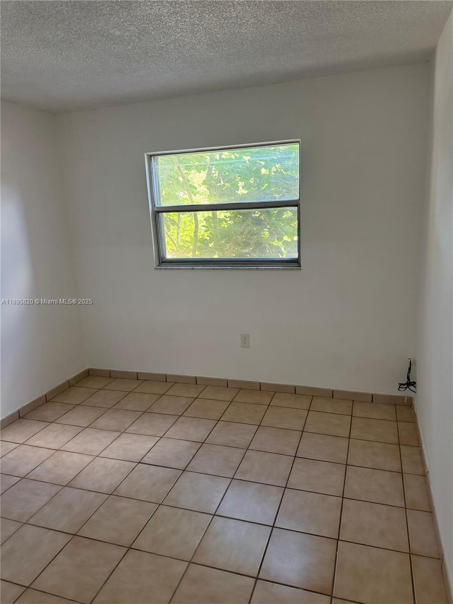 4265 NW South Tamiami Canal Dr # 214 Unit: 1-214