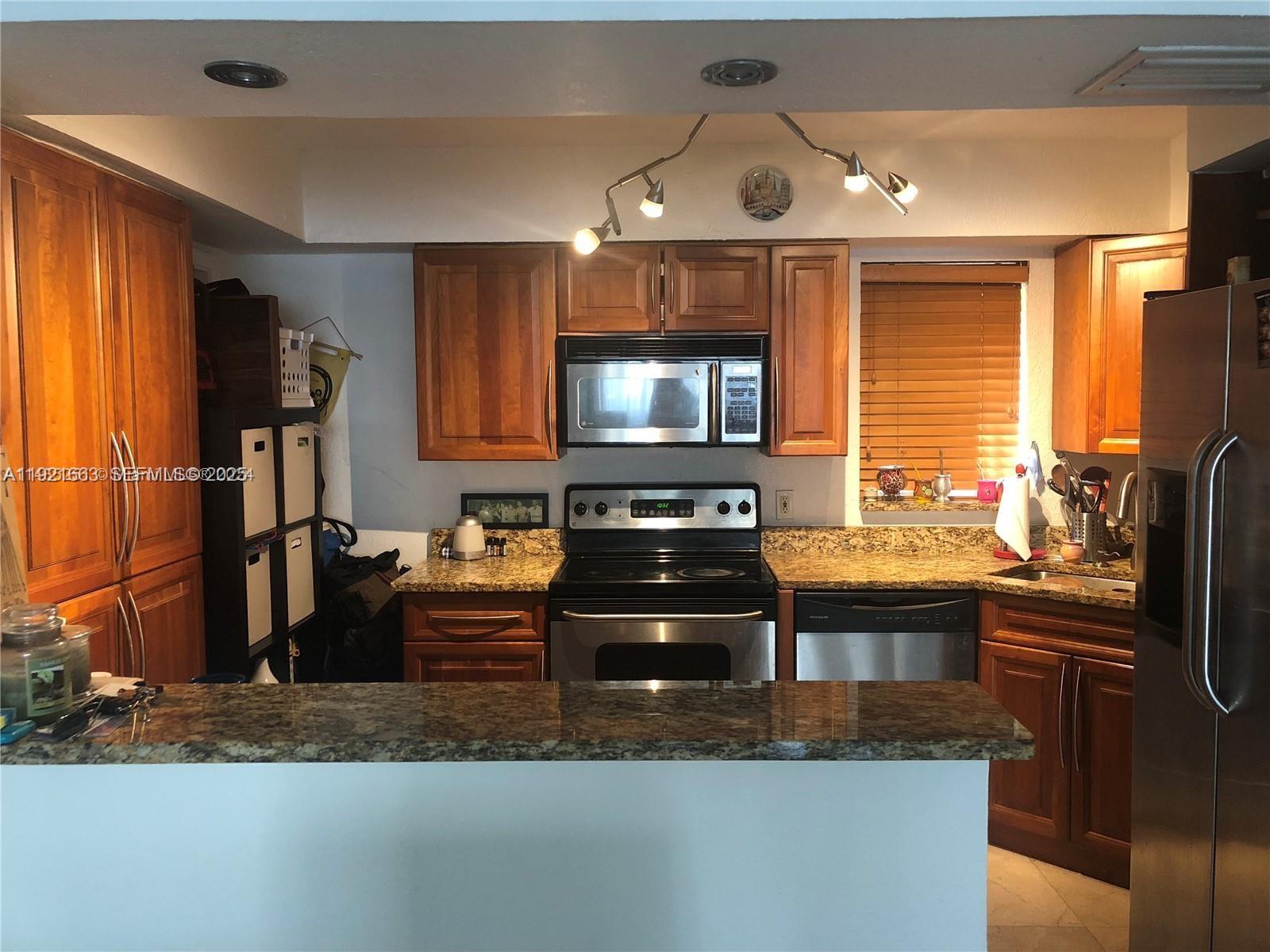 9971 W Bay Harbor Dr # 101