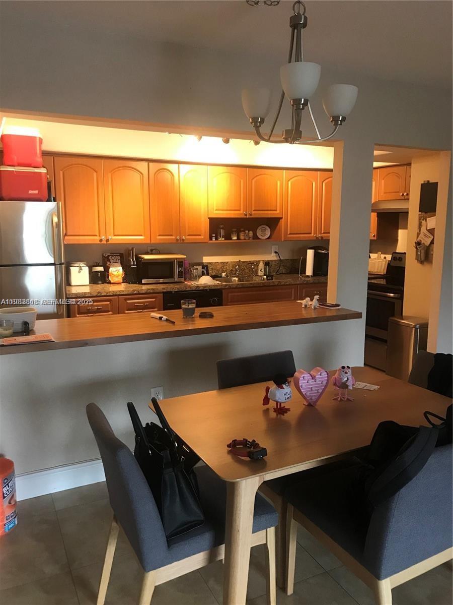 7907 SW 104th St # 203H