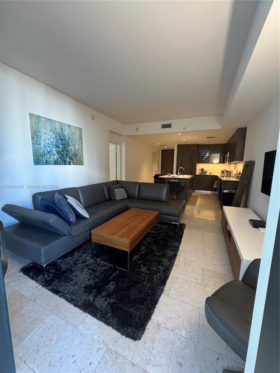 88 SW 7th St # 805