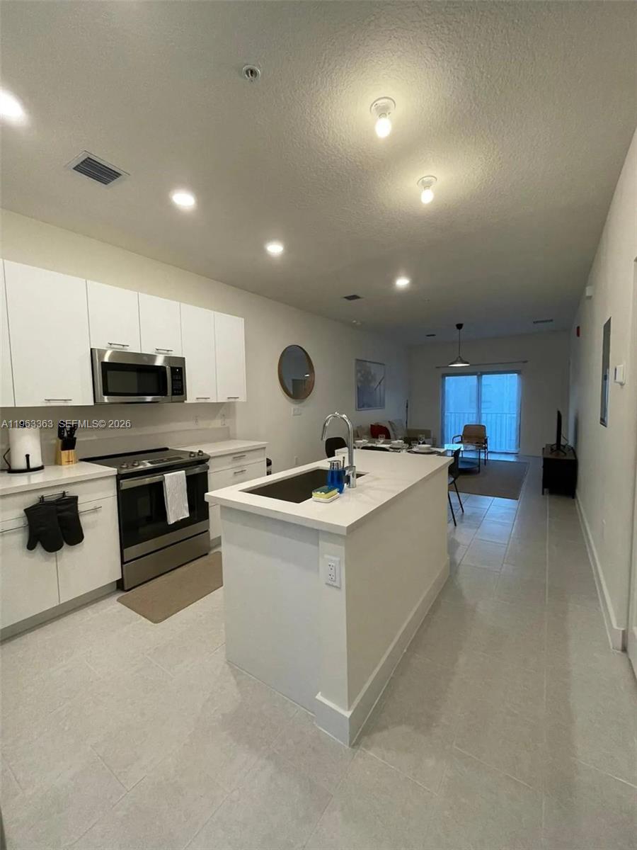 8167 NW 41st St # 402 Unit: E-402