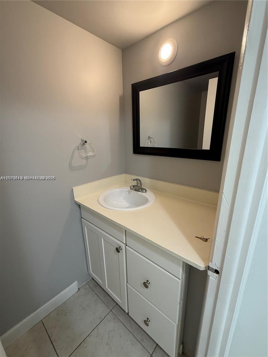 9971 W Bay Harbor Dr # 205