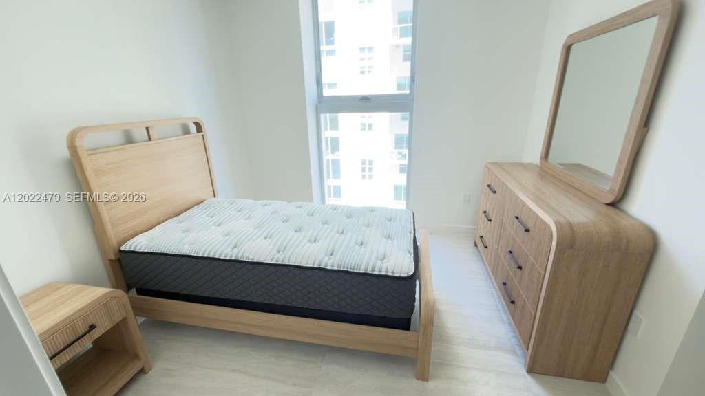 77 SE 5st # 2306