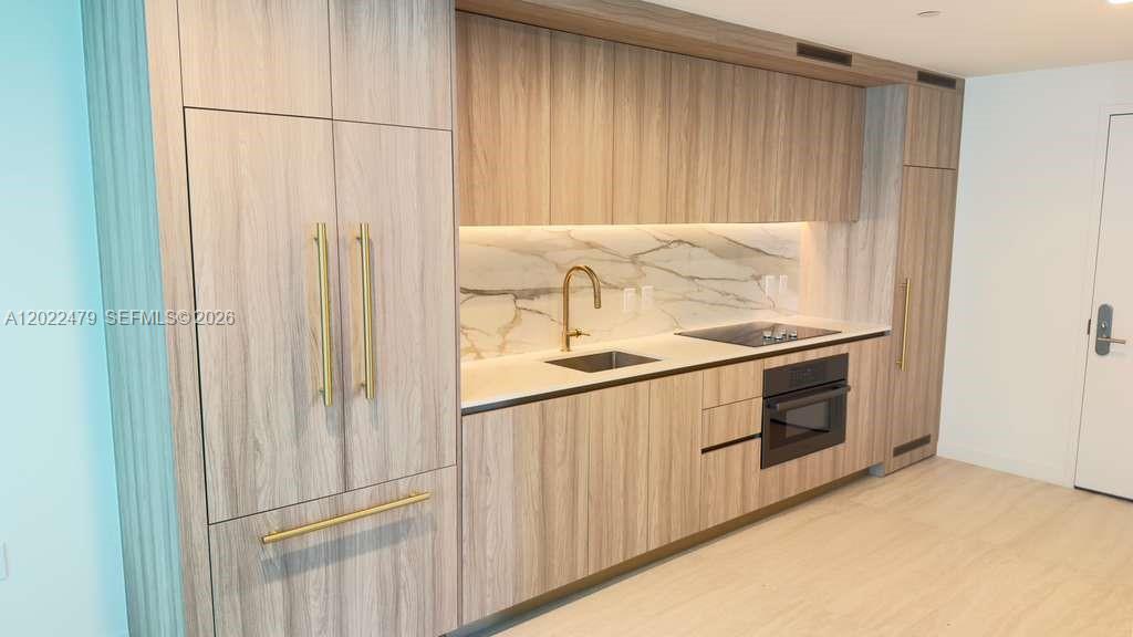 77 SE 5st # 2306