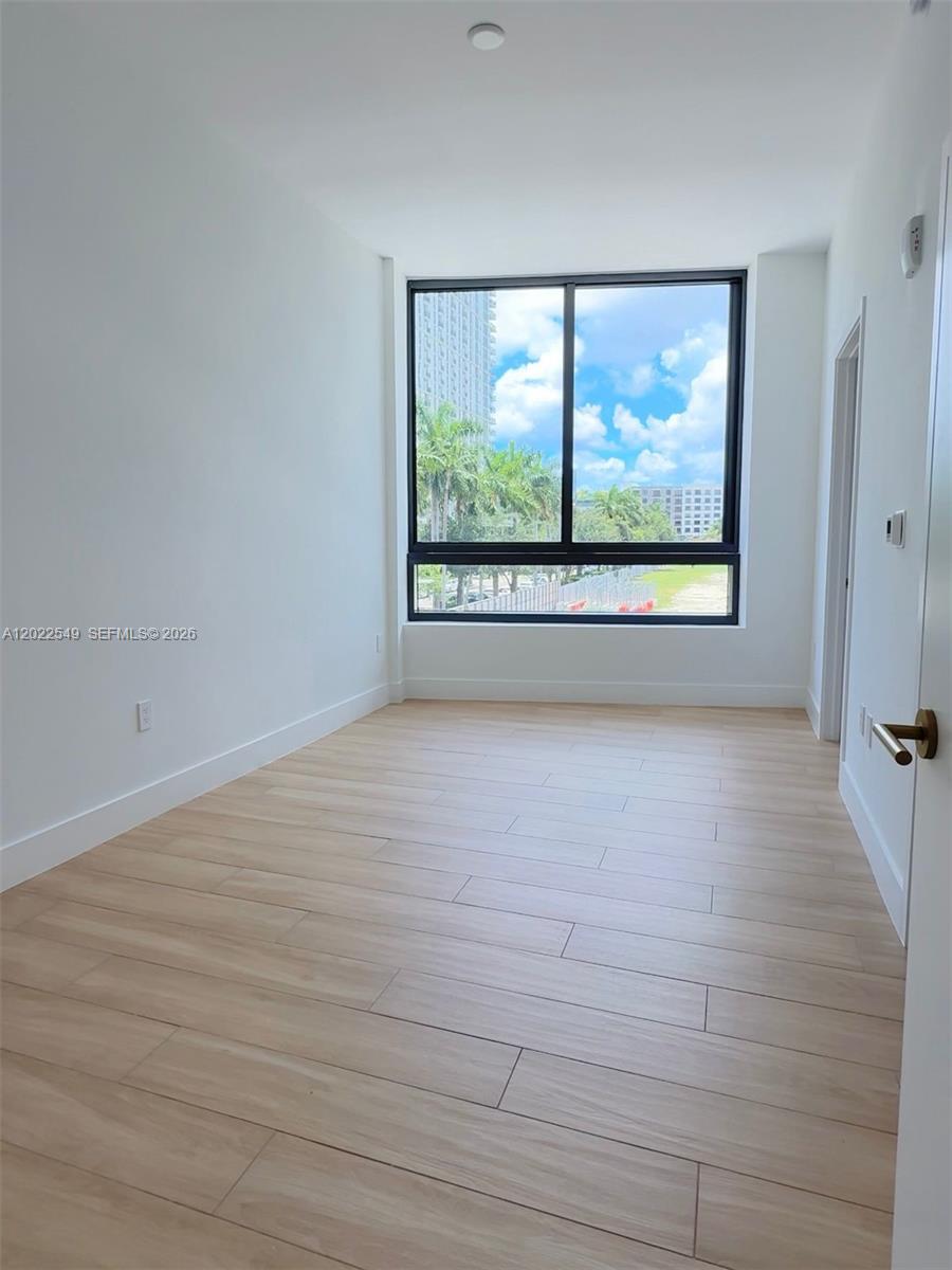 90 NE 32nd ST # 201