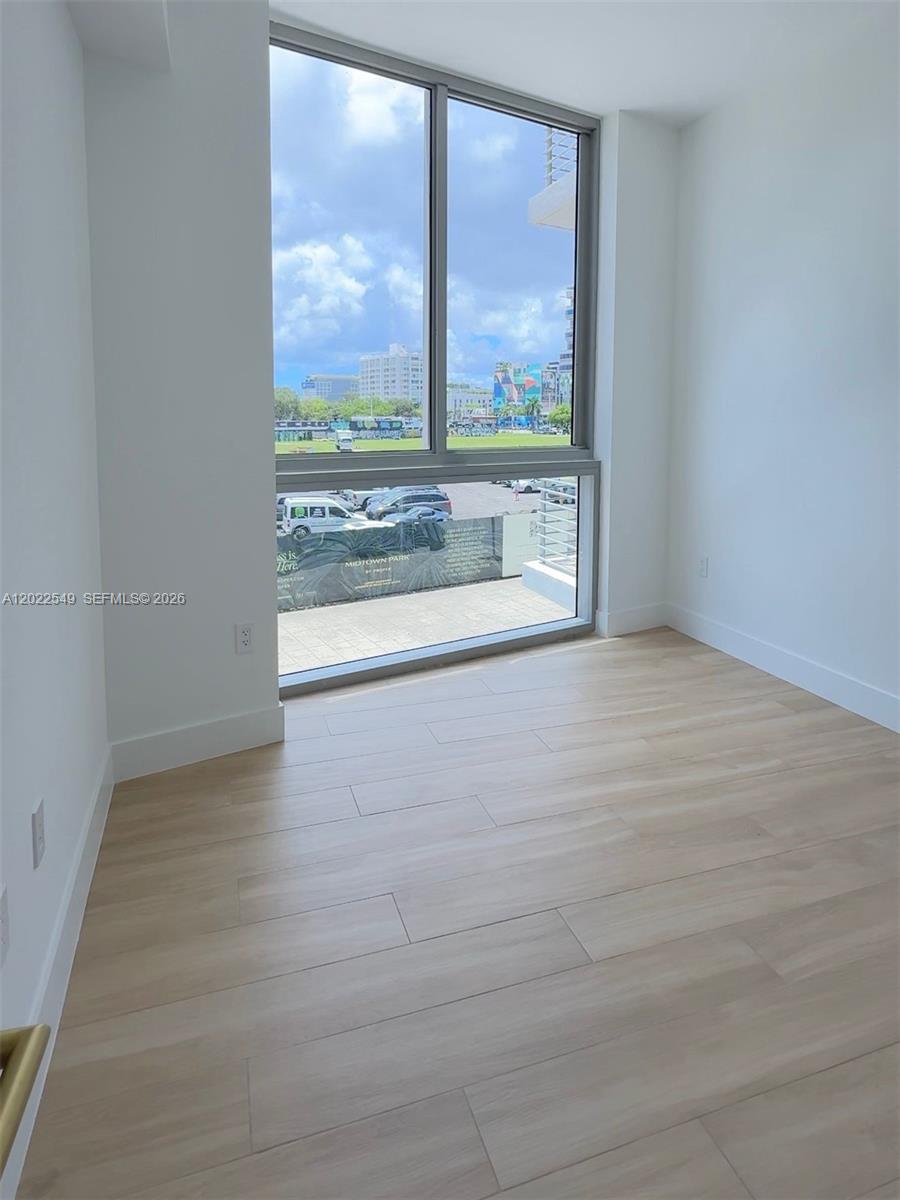 90 NE 32nd ST # 201
