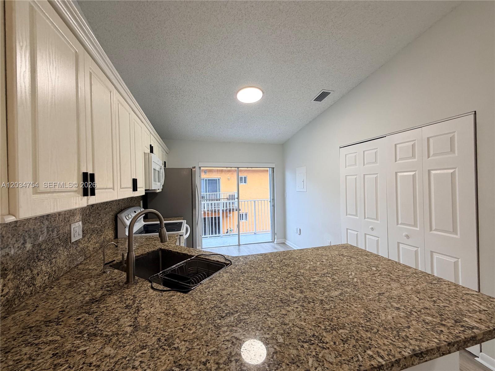 7730 W 34th Ln # 202 Unit: 14-202