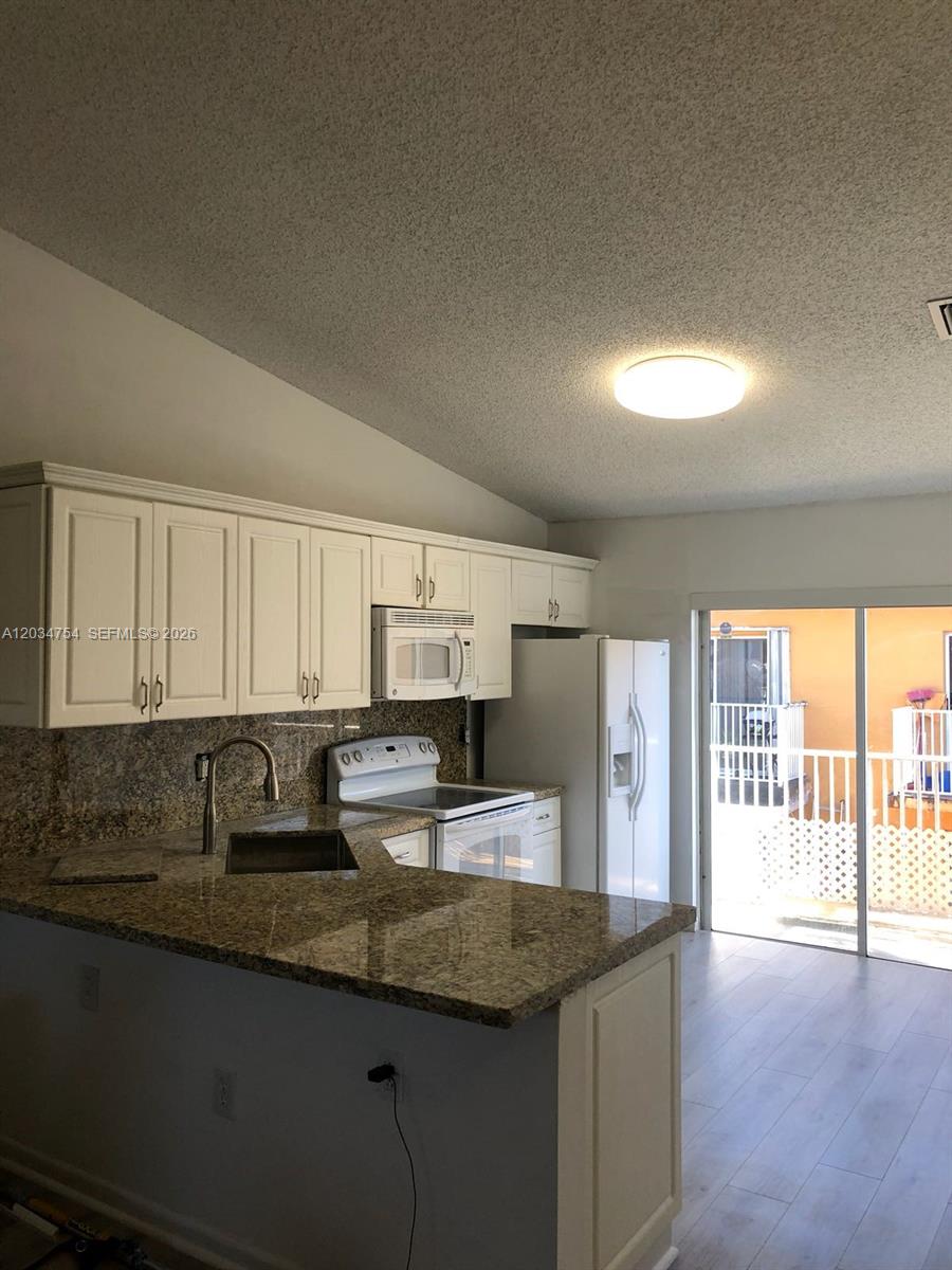 7730 W 34th Ln # 202 Unit: 14-202