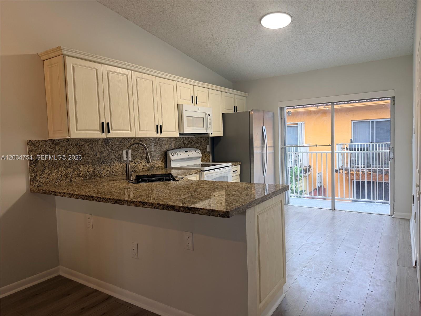 7730 W 34th Ln # 202 Unit: 14-202
