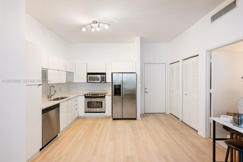 234 NE 3rd St # 909