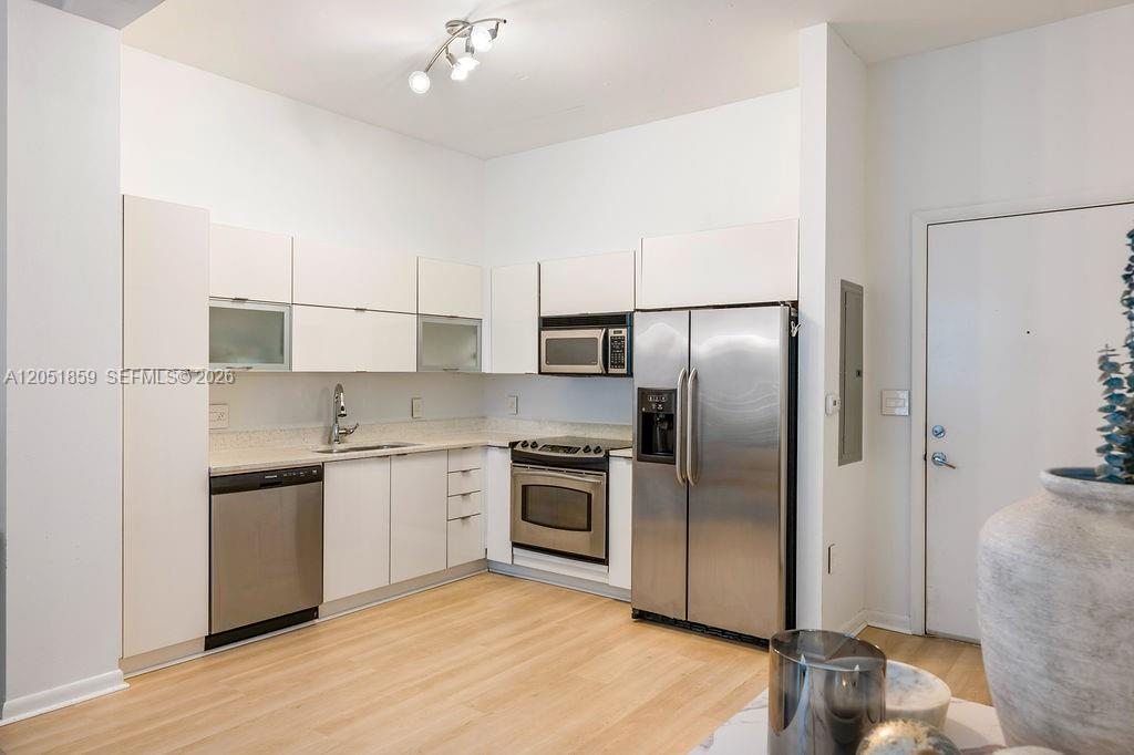 234 NE 3rd St # 909