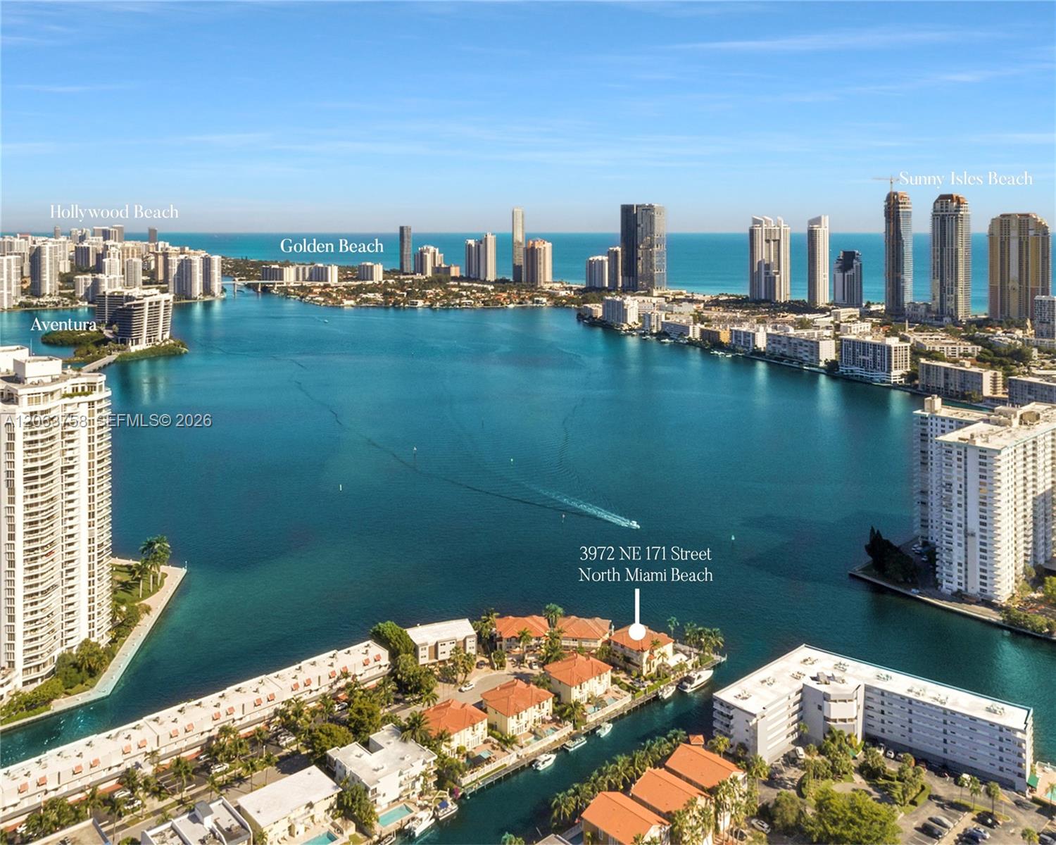 Aerial view of North Miami Beach waterways and skyline, with a marker locating 3972 NE 171 Street.