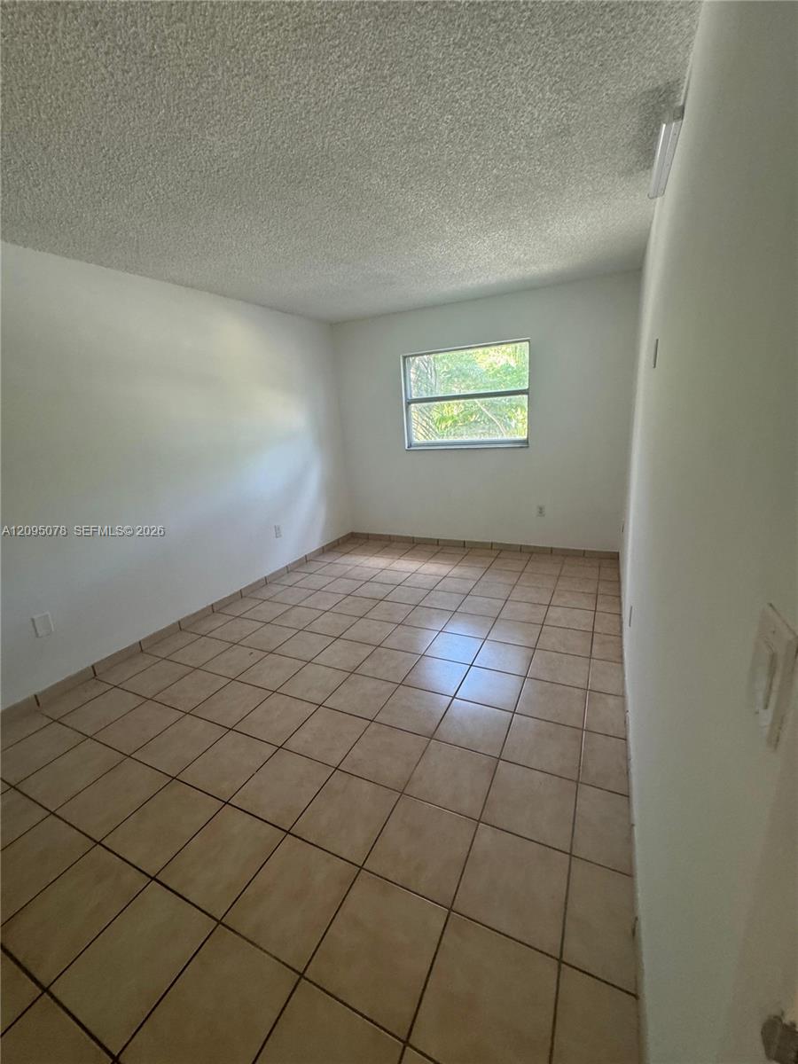 4265 NW South Tamiami Canal Dr # 214 Unit: 1-214