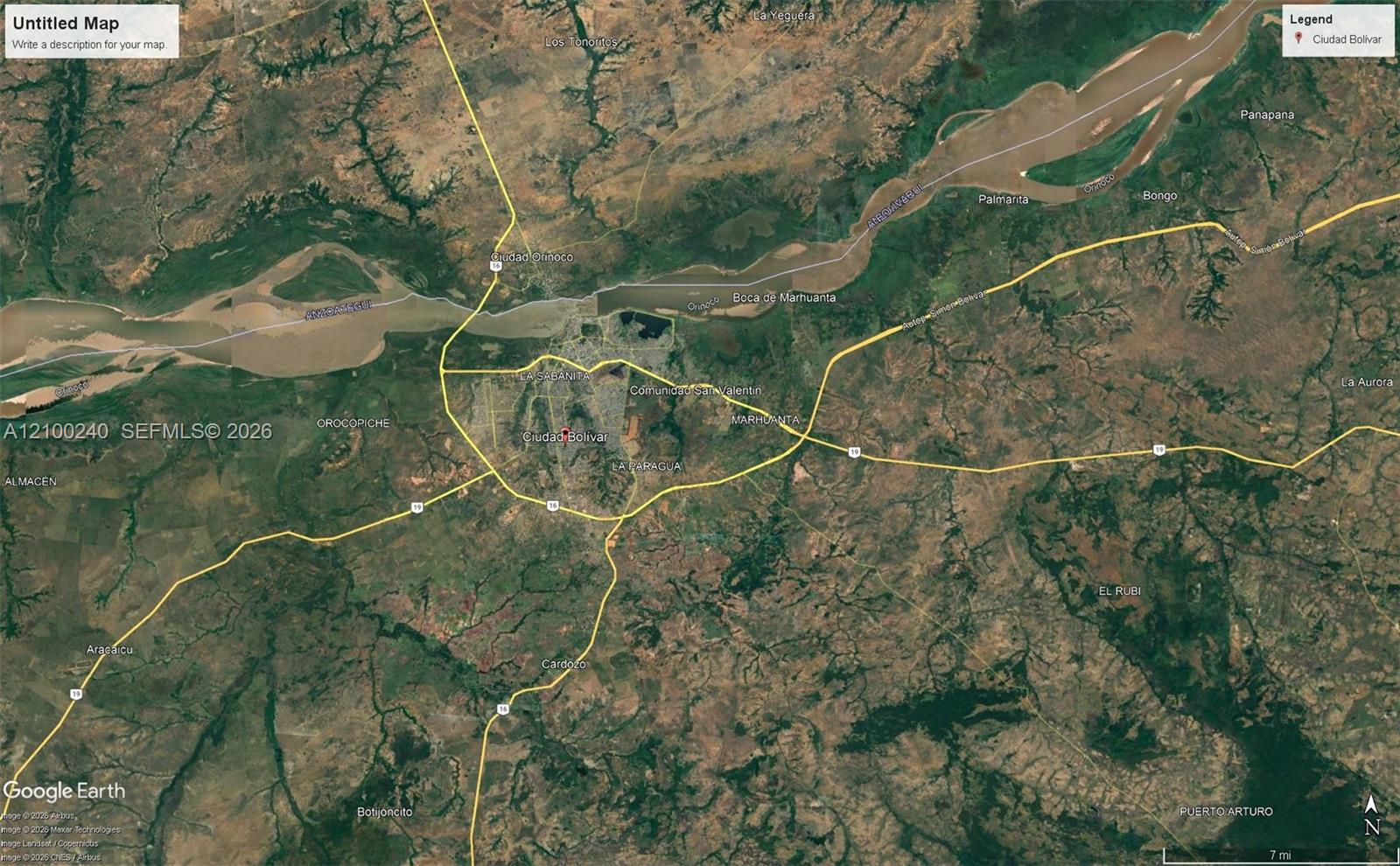Satellite map of Ciudad Bolívar and the Orinoco River, with nearby communities and roads labeled.