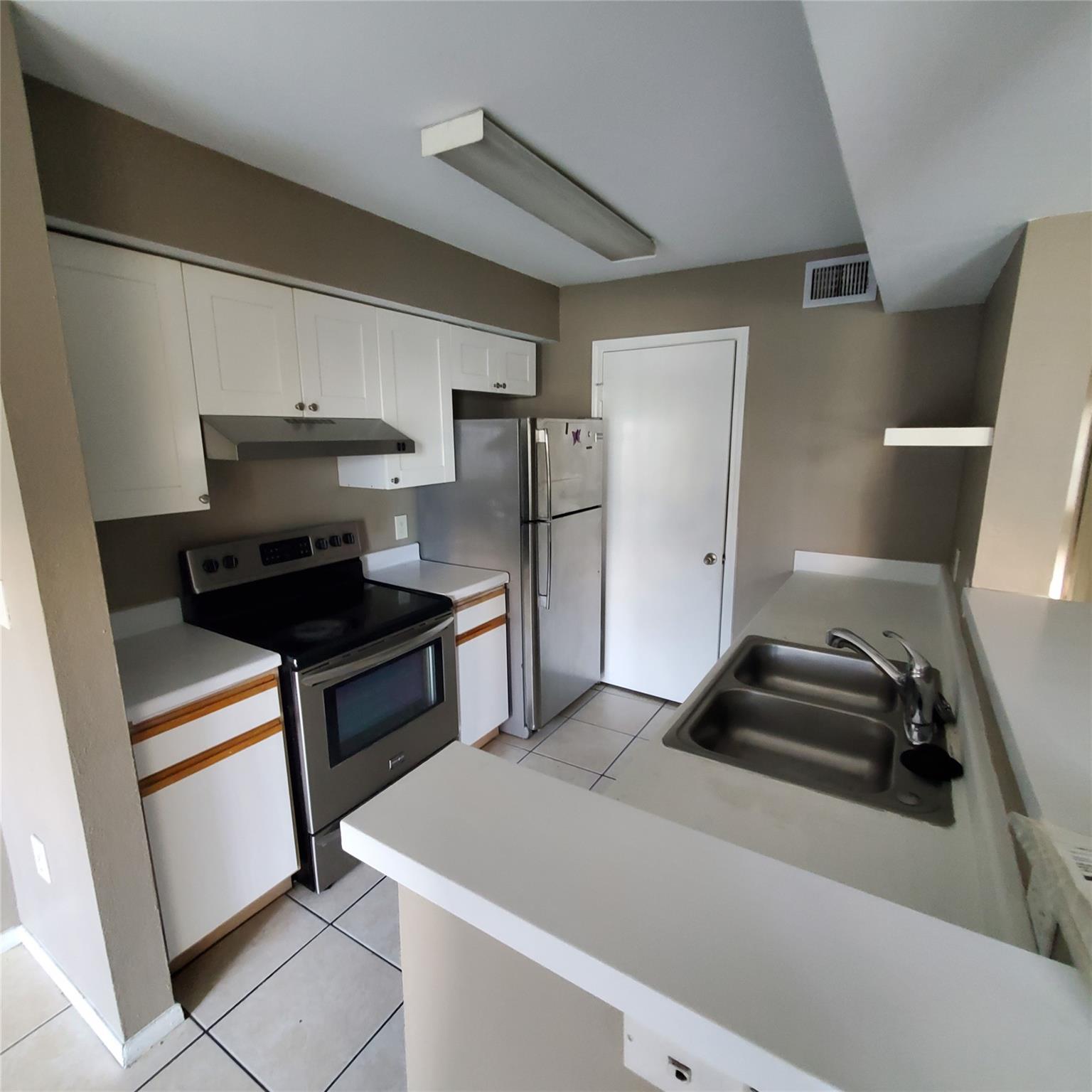 2627 NW 33RD ST 2203