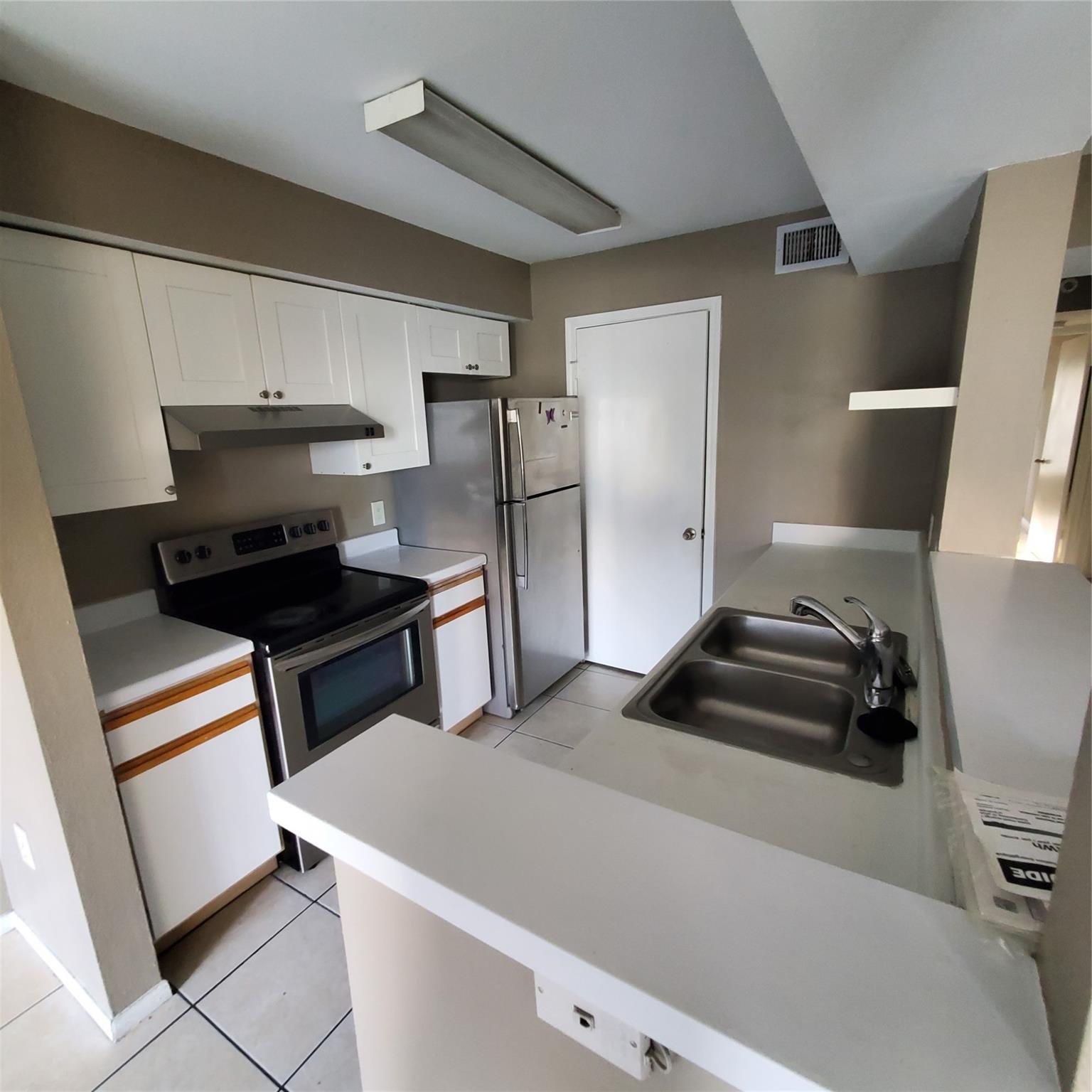 2627 NW 33RD ST 2203