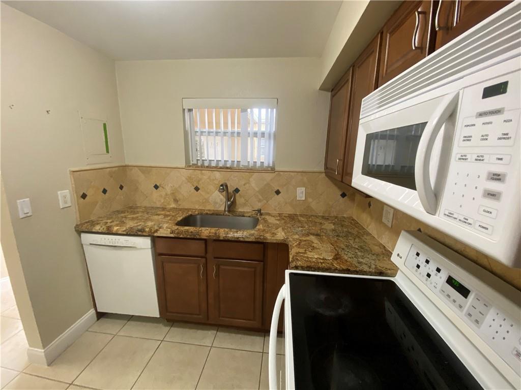 4235 N University Drive # 301