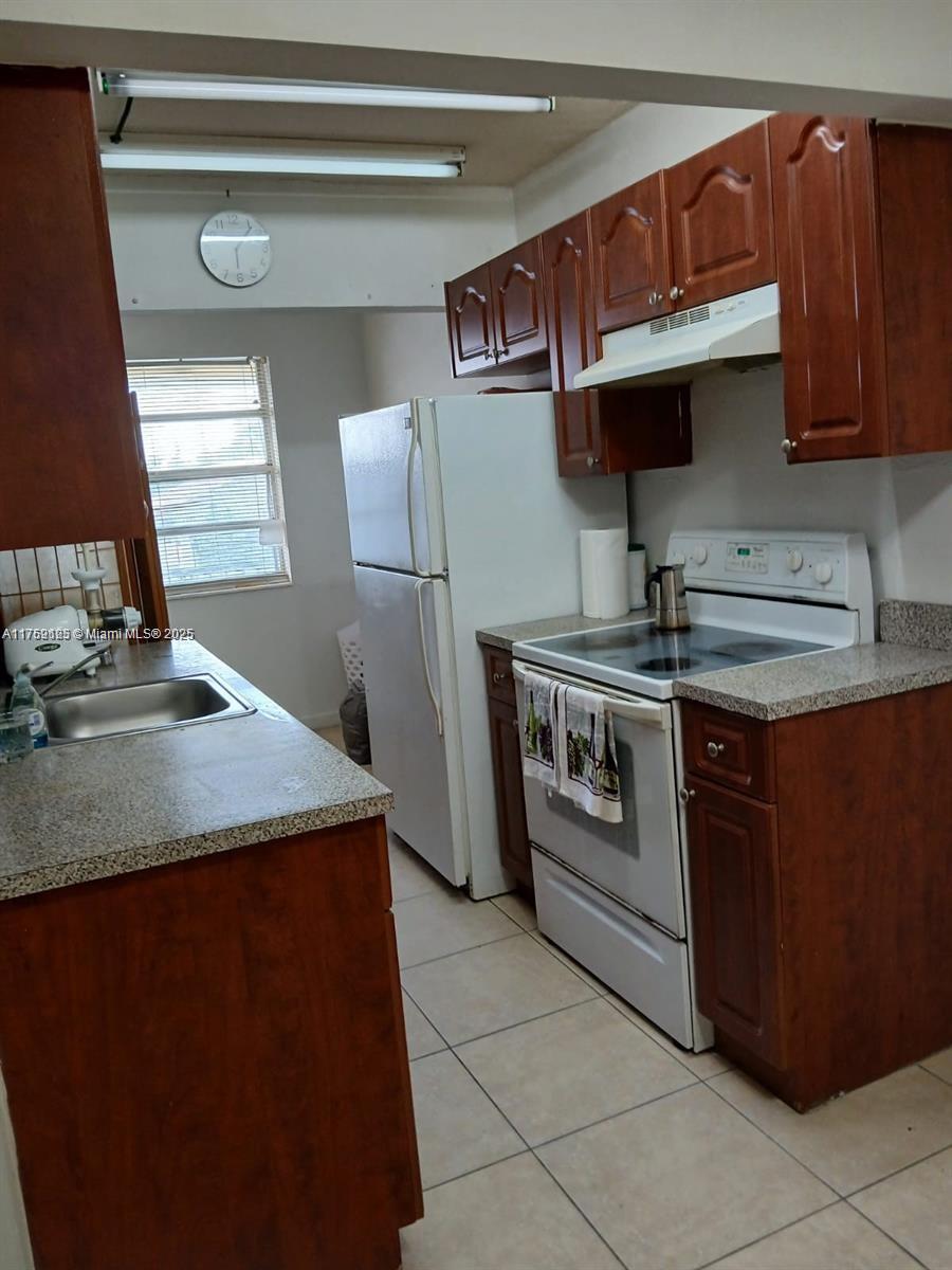 1100 NE 1st Ct # 210
