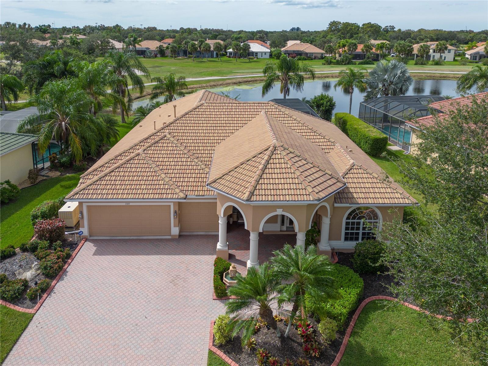7727 CAMDEN HARBOUR DR