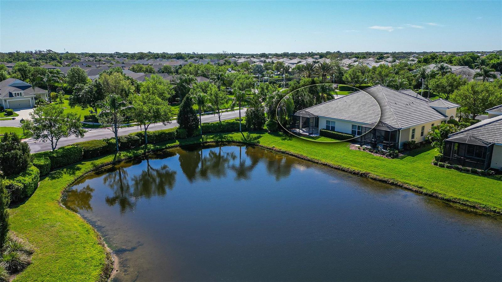 12023 SAWGRASS LAKE TER