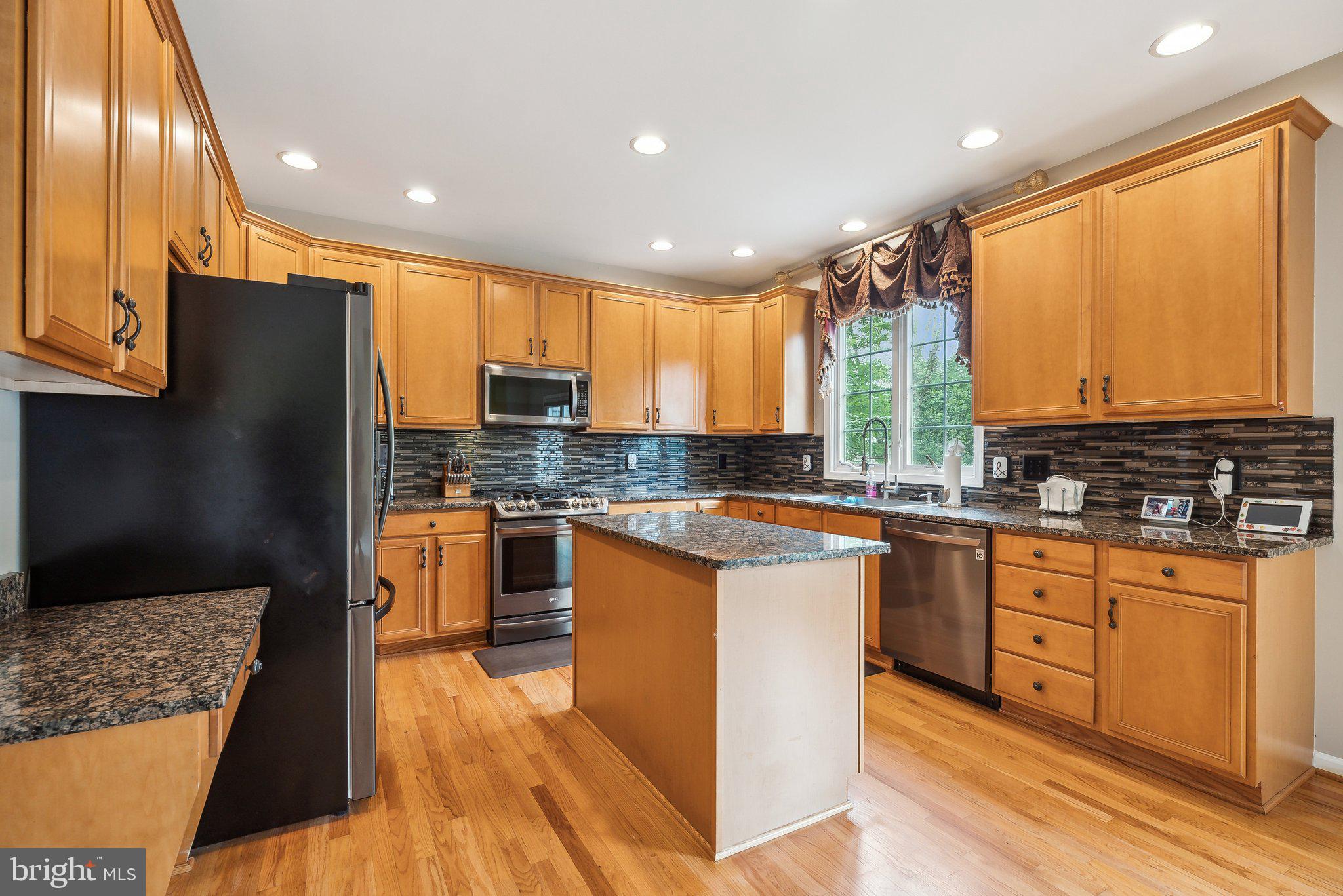 15135 JUPITER HILLS LANE