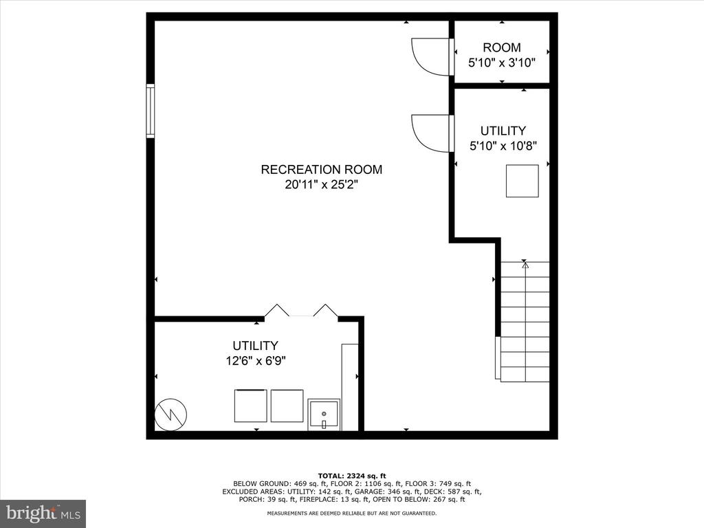 Below-ground floor plan with a large recreation room, two utility areas, a small room, and stairs.