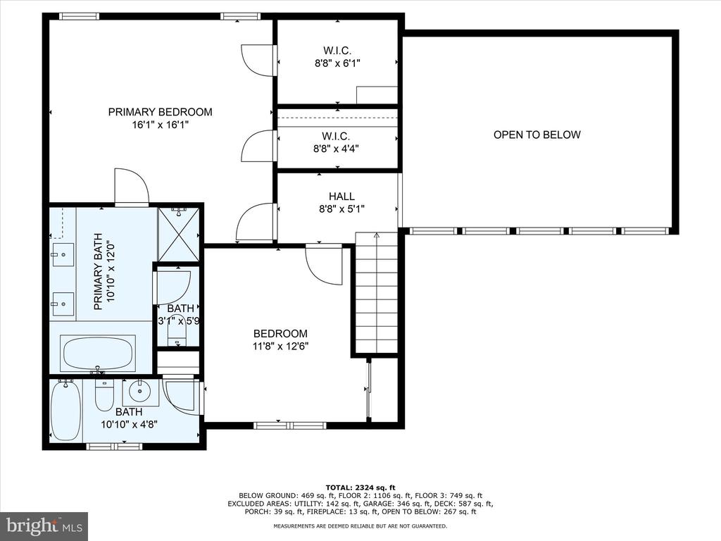 Upper-level floor plan showing bedrooms, bathrooms, walk-in closets, stairs, and an open-to-below area.